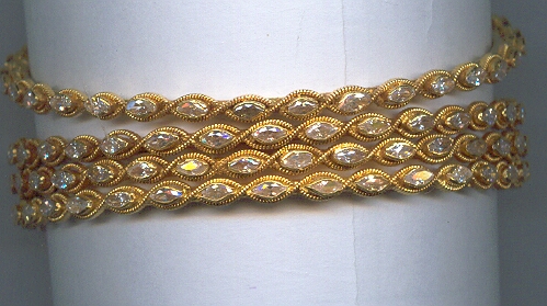 GOLD BANGLE DESIGNER EXCLUSIVE