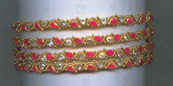 GOLD BANGLE DESIGNER EXCLUSIVE