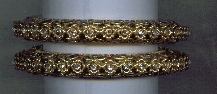 GOLD BANGLE DESIGNER EXCLUSIVE