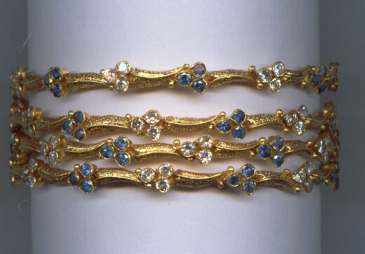 GOLD BANGLE DESIGNER EXCLUSIVE