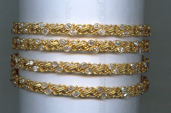 GOLD BANGLE DESIGNER EXCLUSIVE