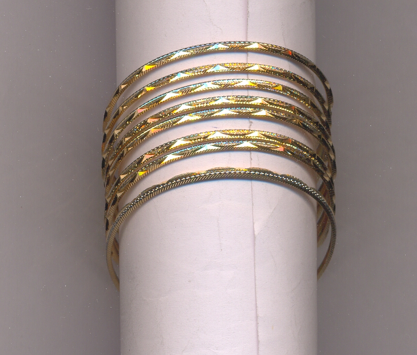 GOLD BANGLE MACHINE CUTTING FANCY