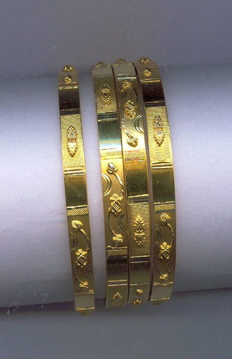 GOLD BANGLE BRONZE SYNDICATE jewellers