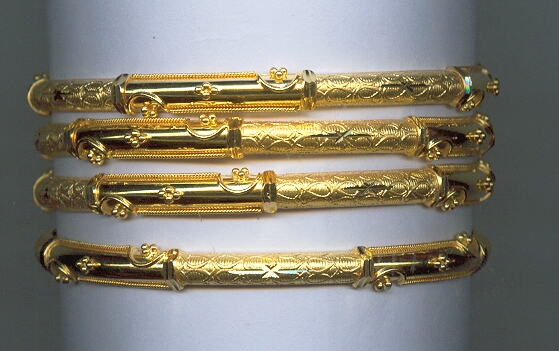 GOLD BANGELS