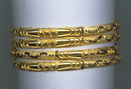 GOLD BANGLES